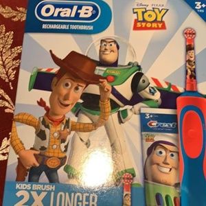 Rechargeable Oral b Toy story tooth brush set